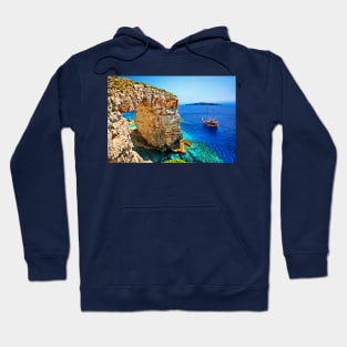 Cruising by the natural rocky arch of Trypitos Hoodie